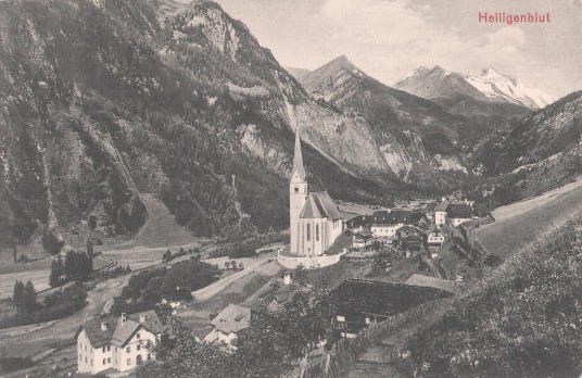 Postkarte: Ort und Kirche Heiligenblut mit Großglockner, um 1920