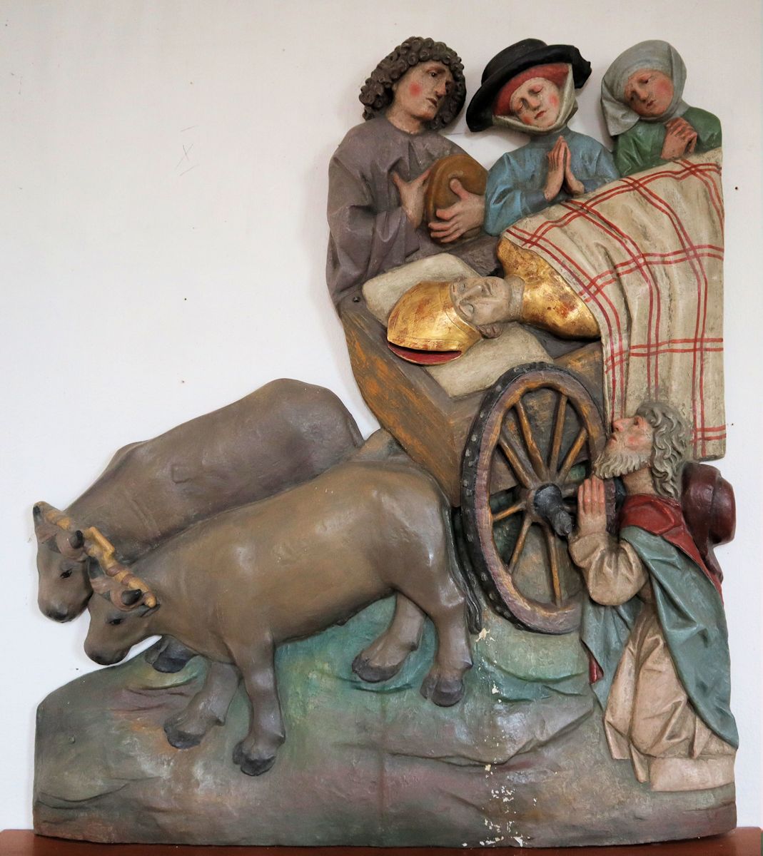 Relief: Emmeram wird nach Aschheim gebracht, in der Kapelle in Kleinhelfendorf