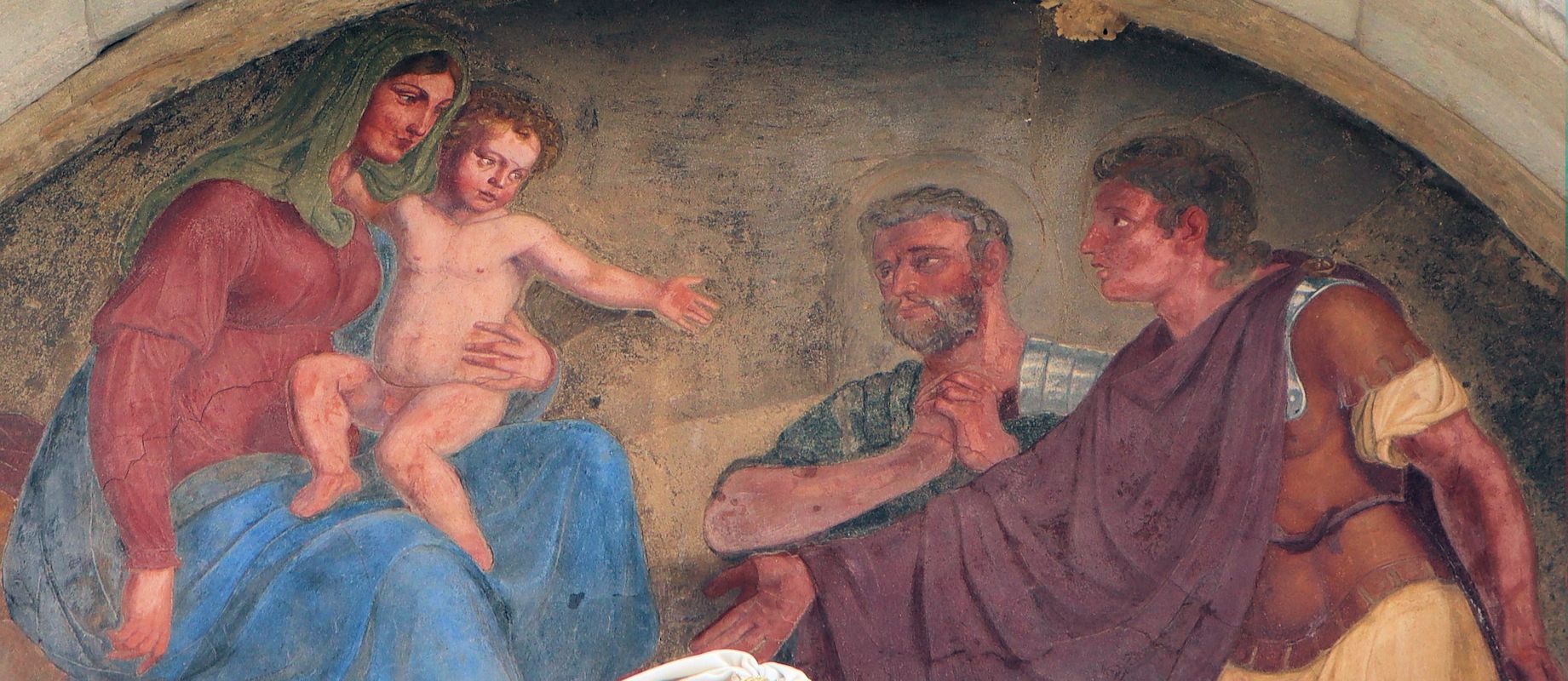 Fresko am Tympanon der Kirche Santi Fermo e Rustico in Caravaggio