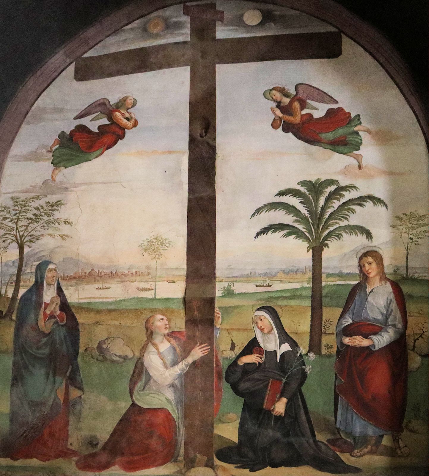 Vincenzo Tamagni: schmerzensreiche Maria, Maria Magdalena, Klara von Montefalco und Johannes von links) unter dem Kreuz Jesu, um 1529, in der Kirche Sant'Agostino in San Gimignano