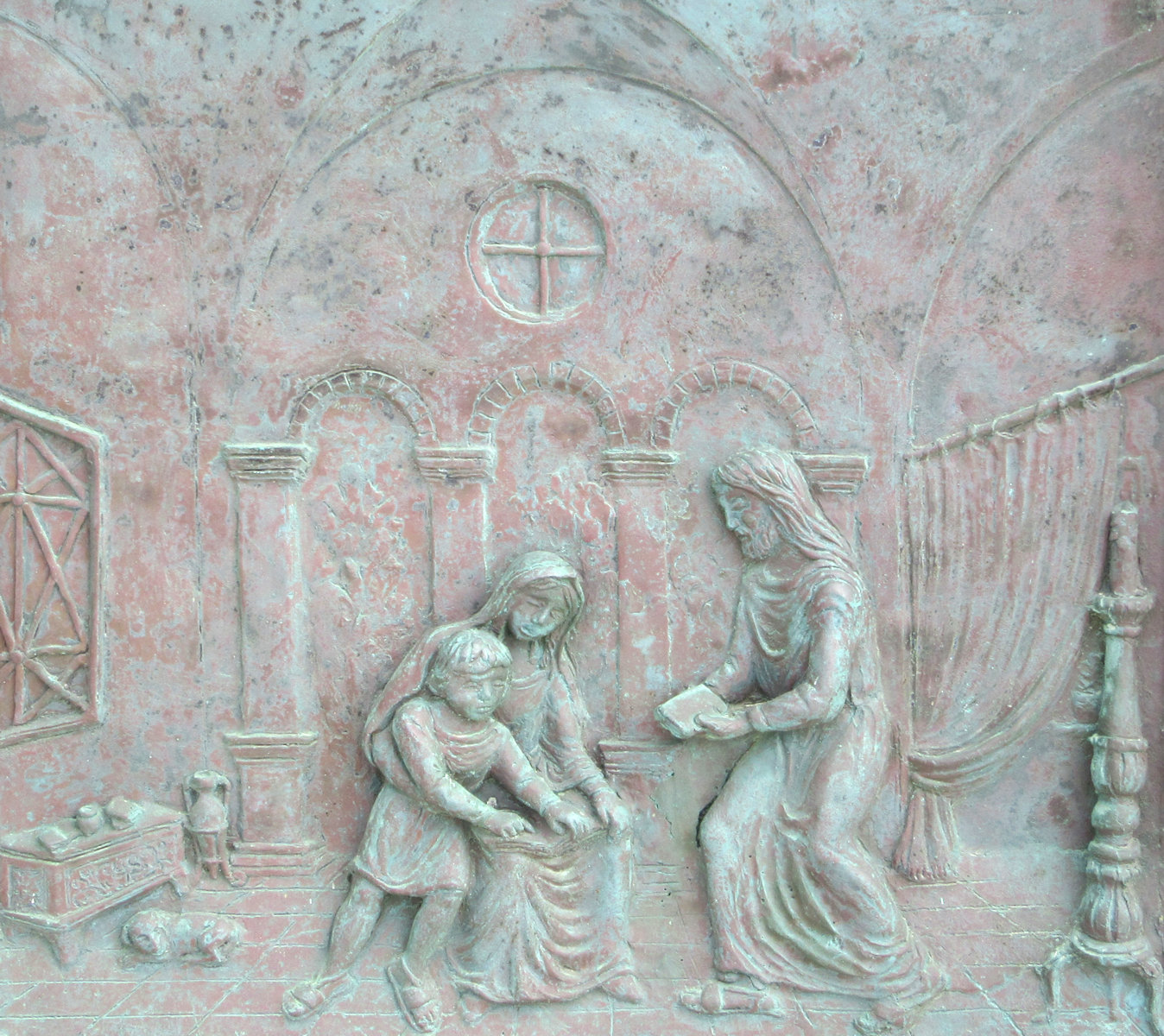 Bronzerelief: Veit wird von Crescentia und Modestus im Glauben unterrichtet, an der Tür der Kirche San Vito a Mare in Mazara del Vallo