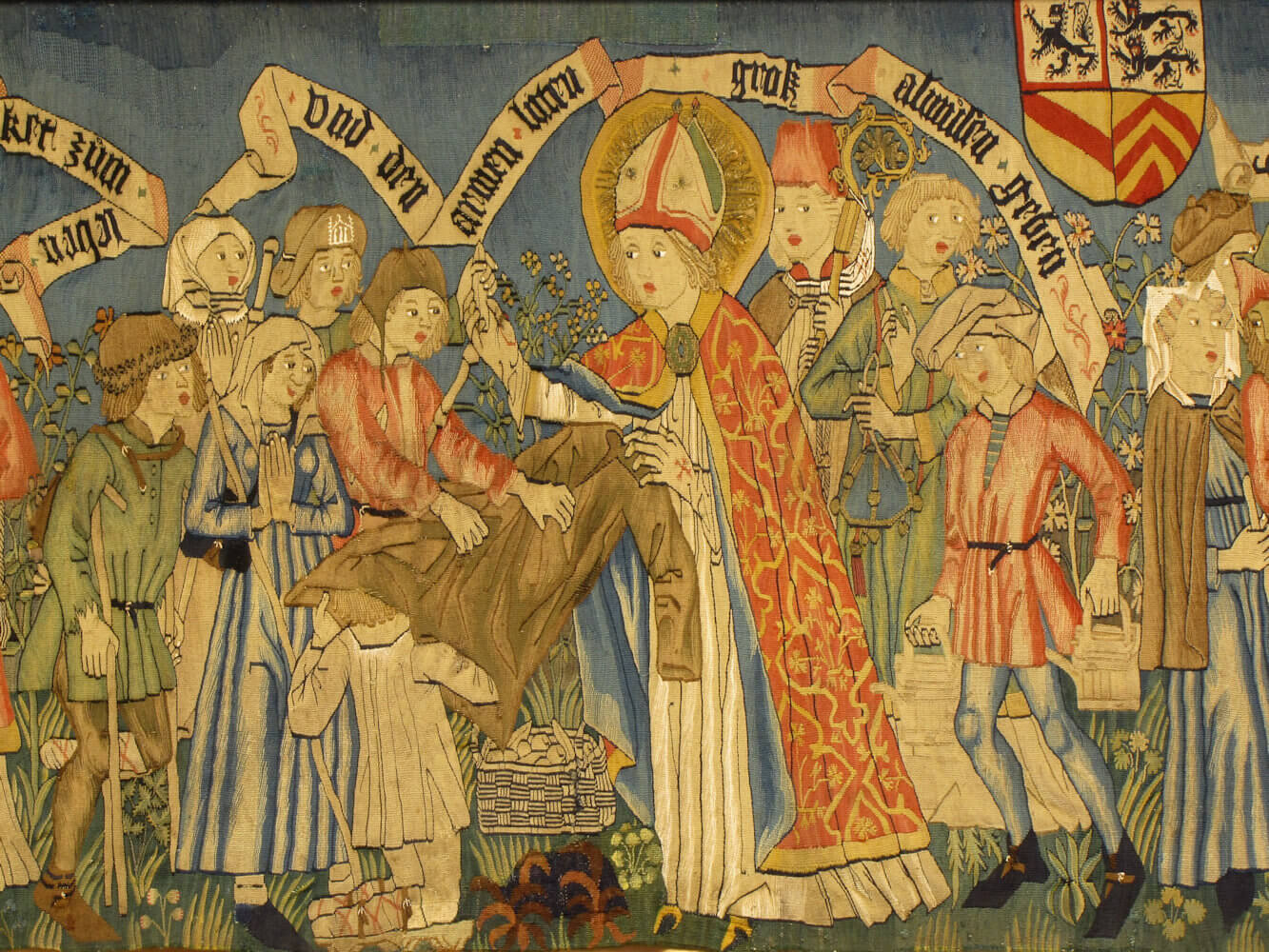 Tapisserie: Adelphus kleidet die Armen, 16. Jahrhundert, in der ehemaligen Klosterkirche in Neuweiler