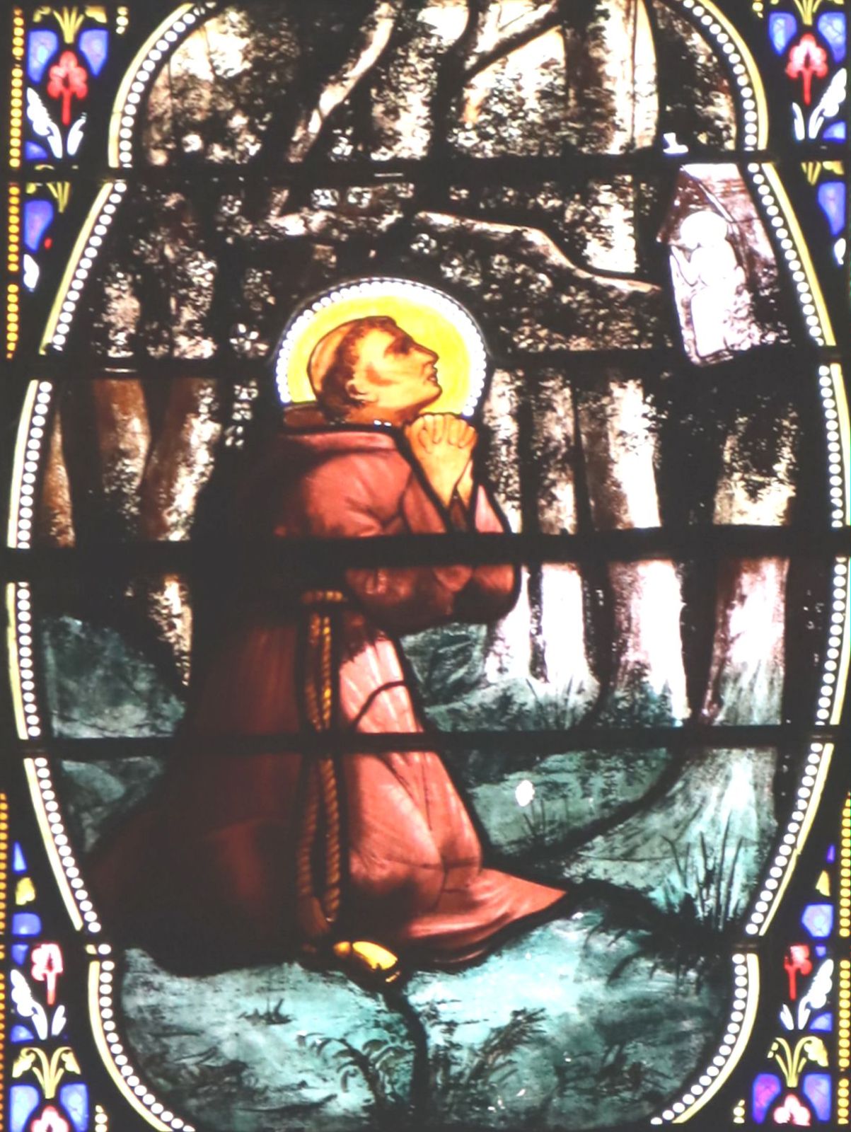 Glasfenster: Junianus betet, in der Kirche des ehemaligen Klosters Saint-Junien in Saint-Junien
