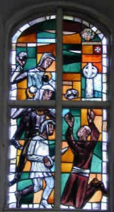 Die Steinigung des Ansverus. Kirchenfenster in der Kirche St.Georg auf dem Berge in Ratzeburg