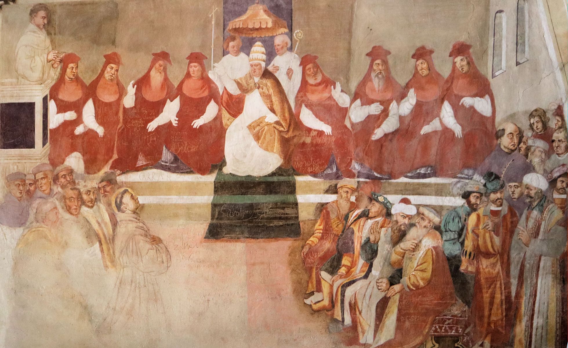 Girolamo Tessari: Antonius (linke Gruppe unten, rechts, mit Heiligenschein) predigt vor dem Papst und Kardinälen, Fresko, um 1336, im Sanktuarium del Noce in Camposampiero