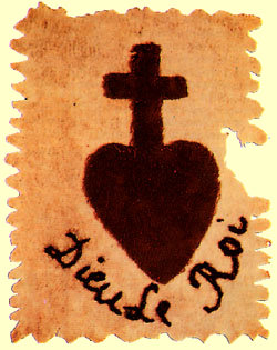Symbol des Widerstands: das heilige Herz mit der Inschrift „Gott ist der König”