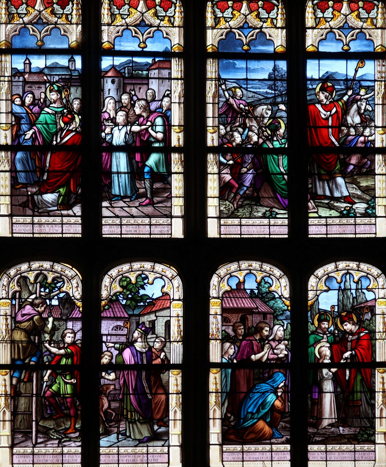 Glasfenster: Germanus bekämpft den Pelagianismus (oben links), kämpft gegen die Pikten (oben rechts), erhebt die Gebeine von Bischof Amator von Auxerre (unten links), ermutigt Genoveva von Paris (unten rechts), in der Pfarrkirche in Pleyben bei Quimper