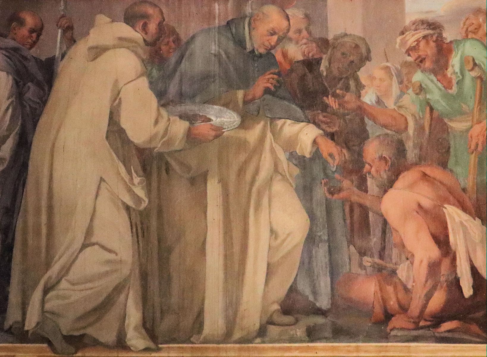 Freskop: Hugo verteilt Almosen, um 1620, in der Kirche der Certosa di Pavia