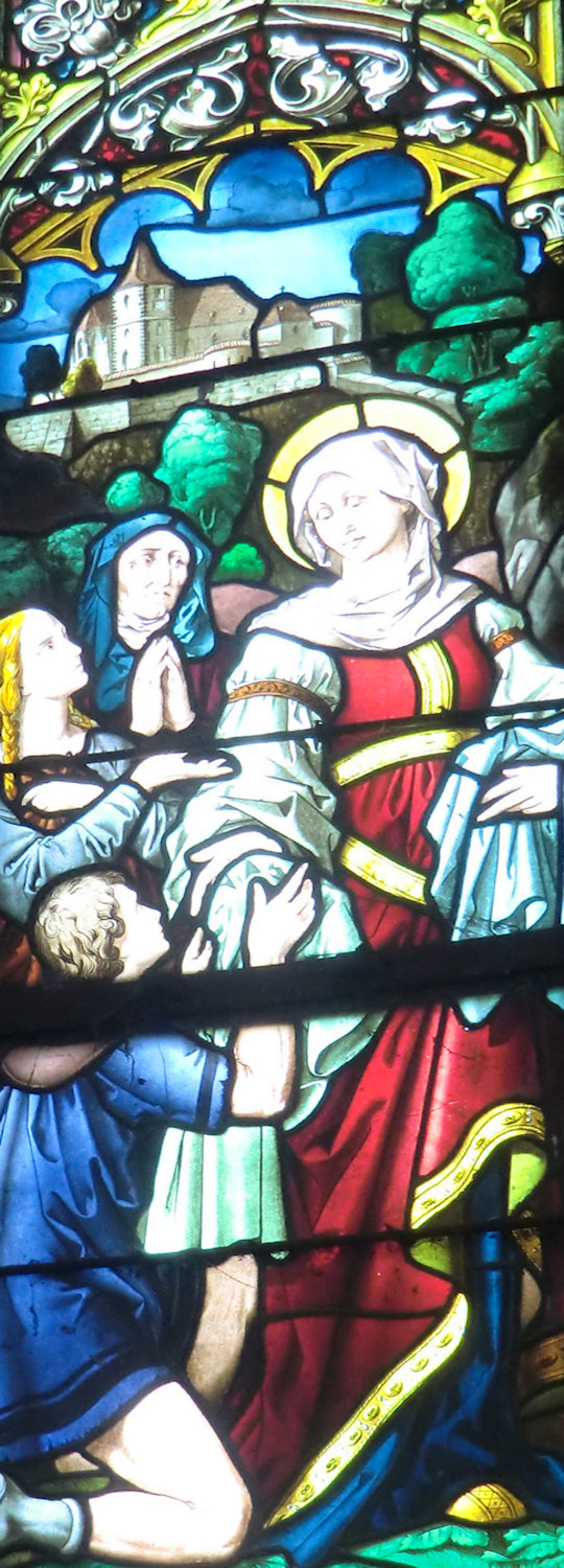 Glasfenster: Huna verteilt Kleider an Arme, 1879, in der Kirche in Hunawihr