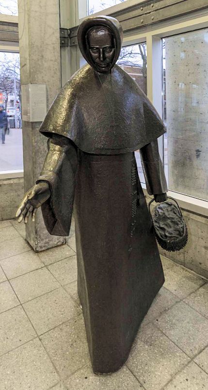 Raoul Hunter: Bronzestatue, 1999, in der U-Bahn-Station auf dem nach Emilie benannten Platz in Montréal