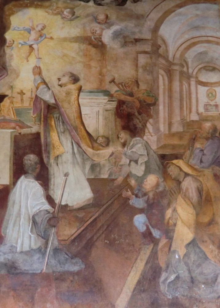 Bild: Engel erscheinen Nikolaus, während er die Messe liest, im Oratorium des Klosters, damals Nikolaus' Zelle, neben der Großen Kapelle der Basilica di San Nicola in Tolentino