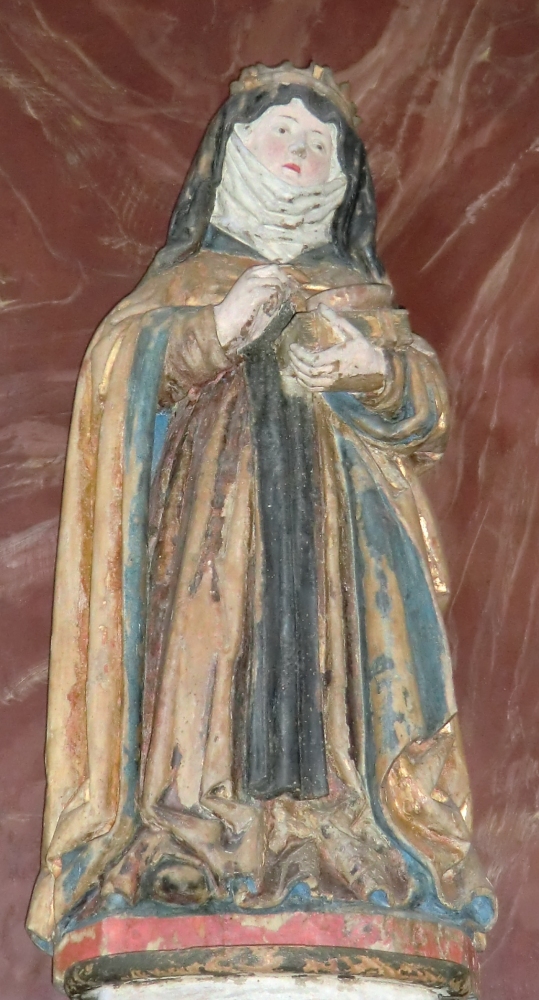 Statue: Odilia mit dem „Buch der Klostersatzungen” und Augenpaar, 15. Jahrhundert, im Dom in Arlesheim