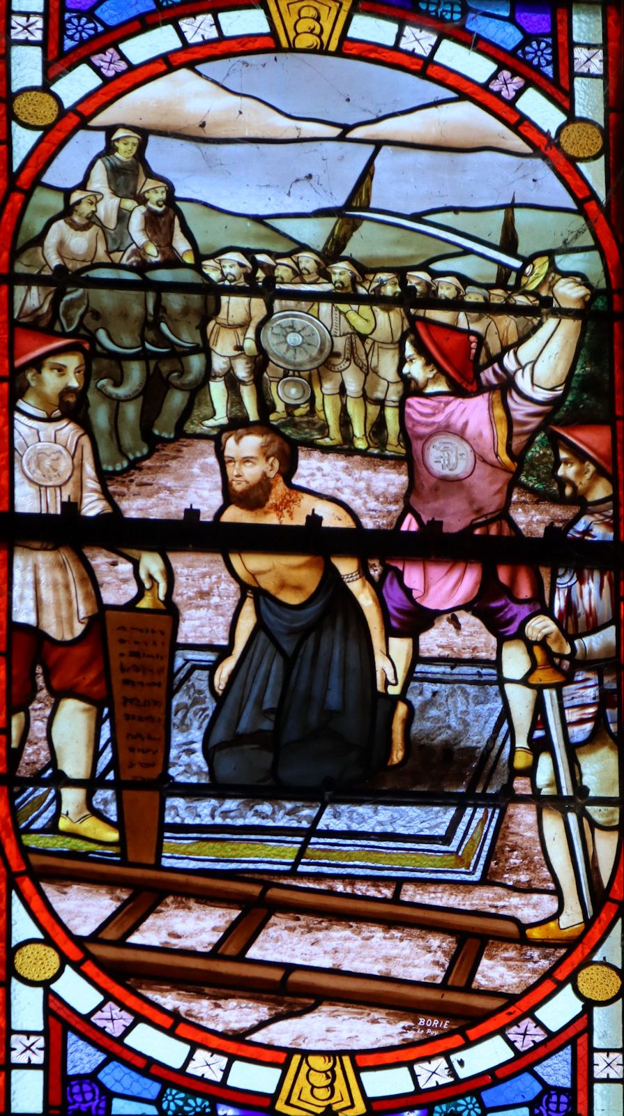 Glasfenster: Petrus' Enthauptung, in der Pfarrkirche in Beynat